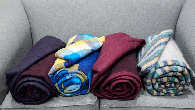 A basic step by step guide on how to make a two sided woollen throw using fabrics. Great DIY presents that you can customise as much as you like. Free access.