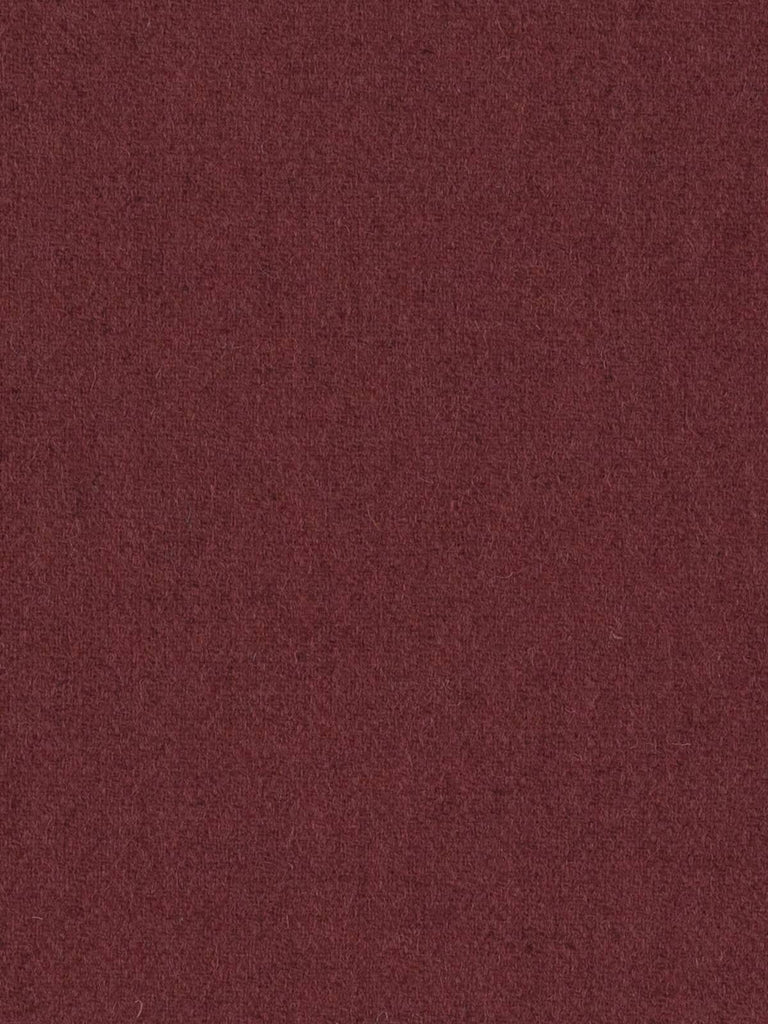 Overhead flat shot of Autumn Garnet Yorkshire lambswool herringbone, revealing rhythmic chevron weave in saturated garnet-red and natural grey melange yarns, fine gauge for a light, elegant drape