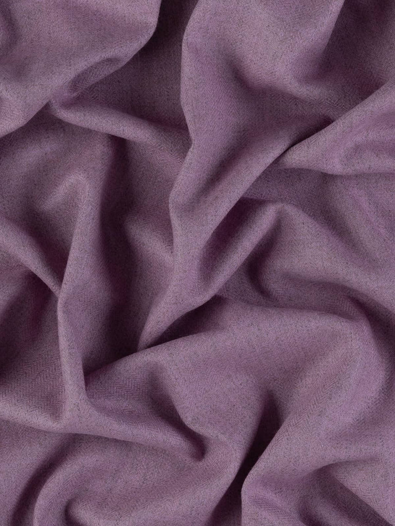 Overhead flat shot of Autumn Lilac Yorkshire lambswool herringbone, revealing delicate chevron pattern in muted lilac and grey yarns, smooth and refined finish with elegant light drape
