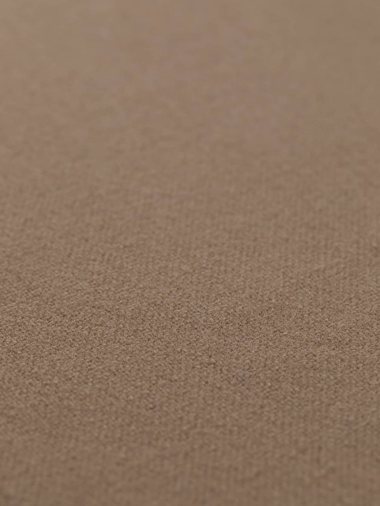Flat angled view of Claystone Beige hopsack fabric, 130cm wide, displaying even weave structure and warm neutral beige shade ideal for outerwear and interiors