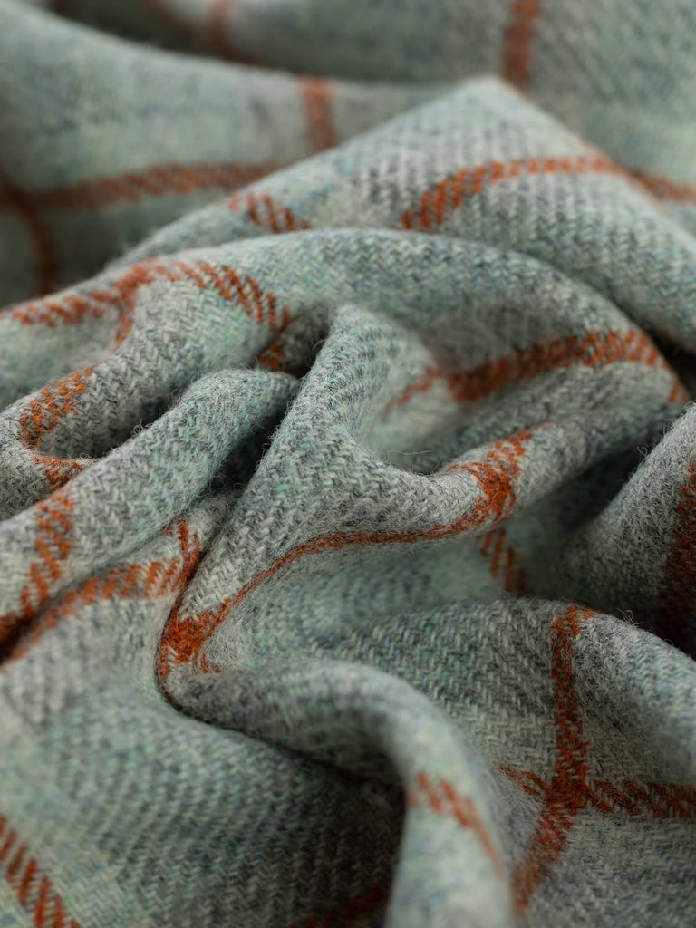 Twist of First Light Yorkshire Windowpane Check, showing watery sky-blue base with marled grey tweed texture and warm Cedarwood overcheck lines