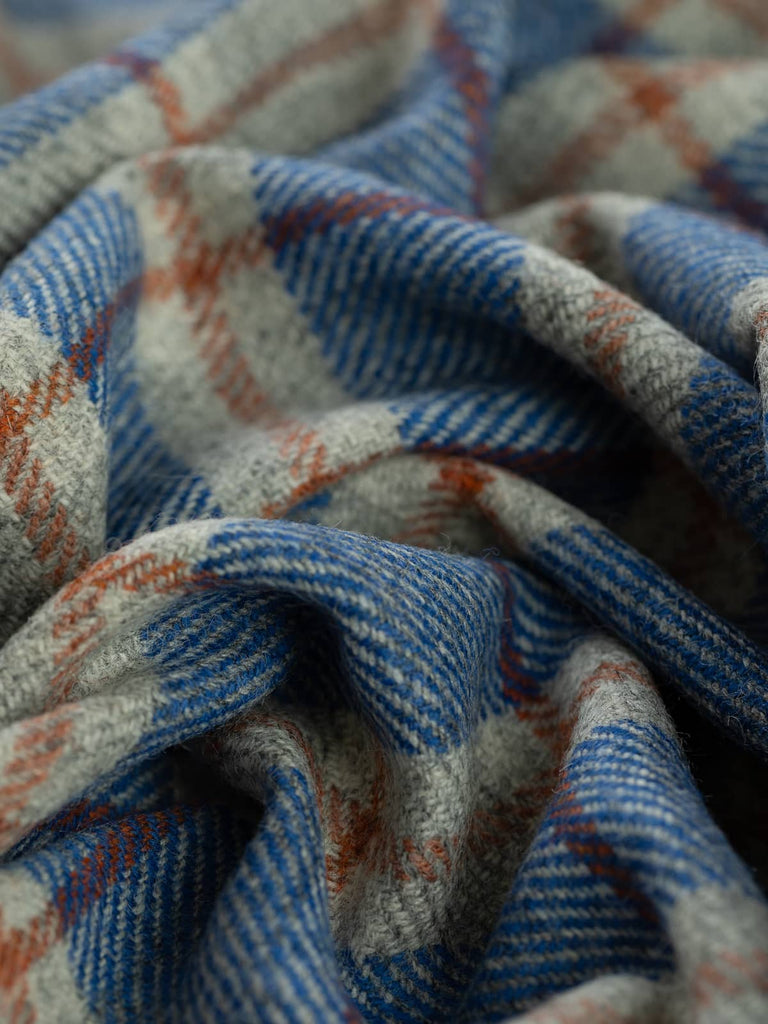 Twist of Stargazer View Yorkshire Windowpane Check, 100% wool, 154cm wide, showing marled grey base with celestial blue accents and warm Cedarwood overcheck lines