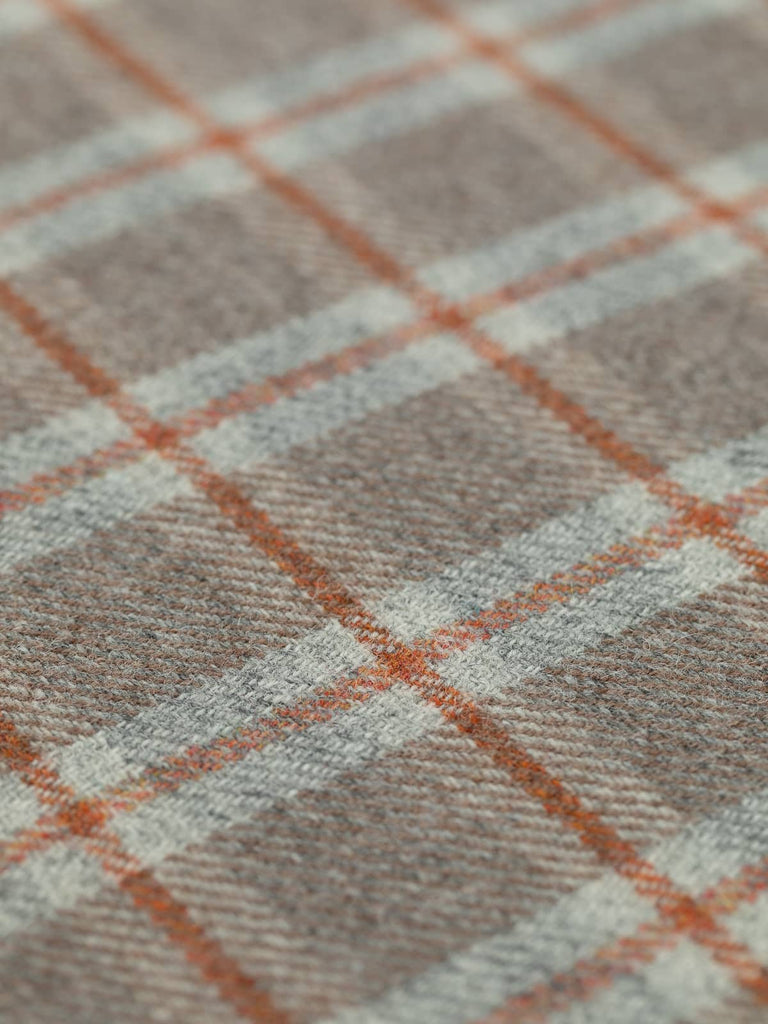 Angled flat view of Autumn View Heritage Check, medium-weight wool with 5cm x 6cm repeat, highlighting autumn-inspired palette of soft browns, frosted grey, and structural Cedarwood windowpane accents