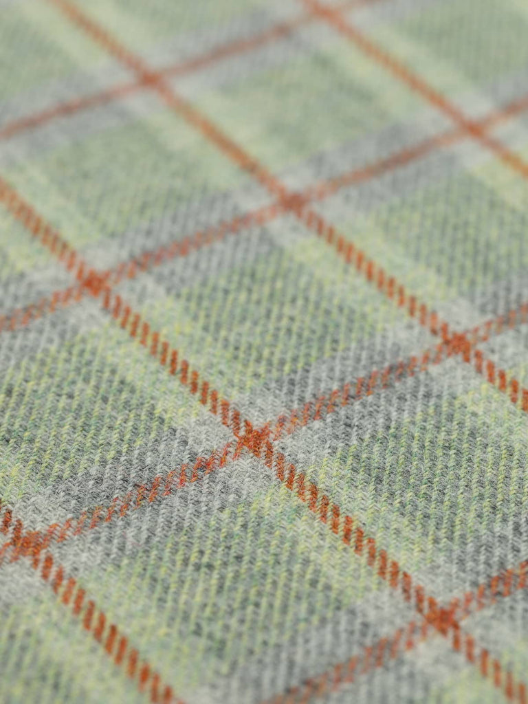 Angled flat view of Shore View Heritage Check, medium-weight wool with 5cm x 6cm repeat, highlighting coastal-inspired palette of translucent green, frosted grey, and structural Cedarwood windowpane accents