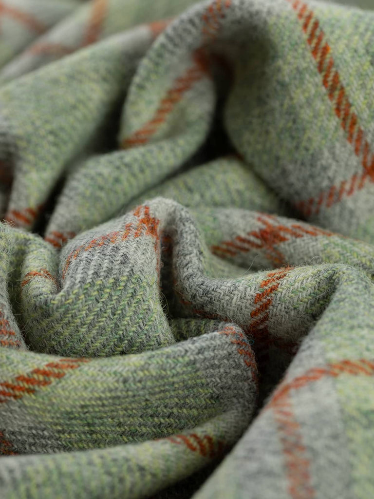 Twist of Shore View Yorkshire Windowpane Check, 100% wool, 154cm wide, showing marled grey base with spring green and seaweed melange, accented by warm Cedarwood overcheck lines