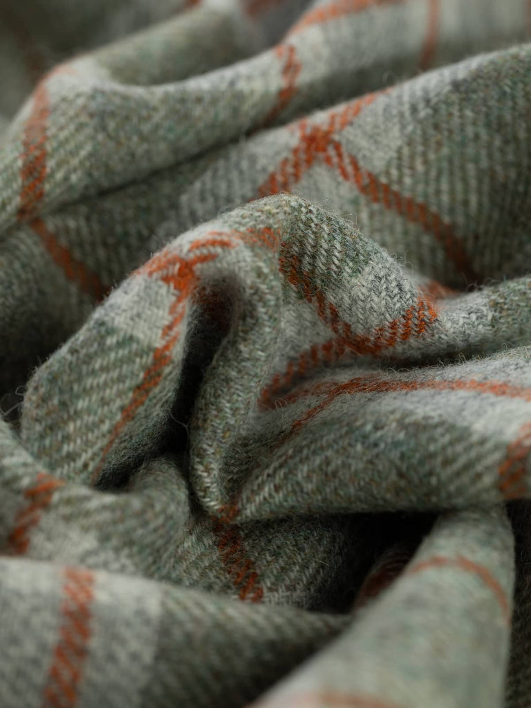 Twist of Mossy View Yorkshire Windowpane Check, 100% wool, 154cm wide, showing marled grey base with lichen and moss green melange and warm Cedarwood overcheck lines