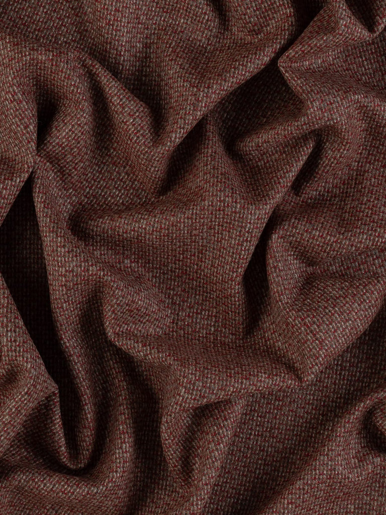100% wool tweed pure wool fabric, reverse birdseye weave, red, brown, orange, beige, grey yarns, mottled all over colour, woven with melange yarn, made in Huddersfield, made in Yorkshire. High quality twill weave wool fabric for clothing, jackets, dresses. buy fabric by the metre