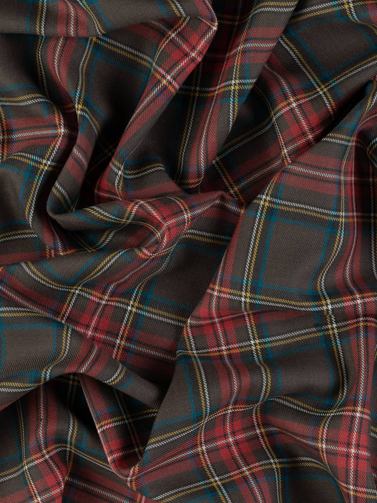 Twist of Princess Mary Muted Tartan 100% wool fabric, showing soft drape, twill texture, and muted multicoloured heritage check pattern