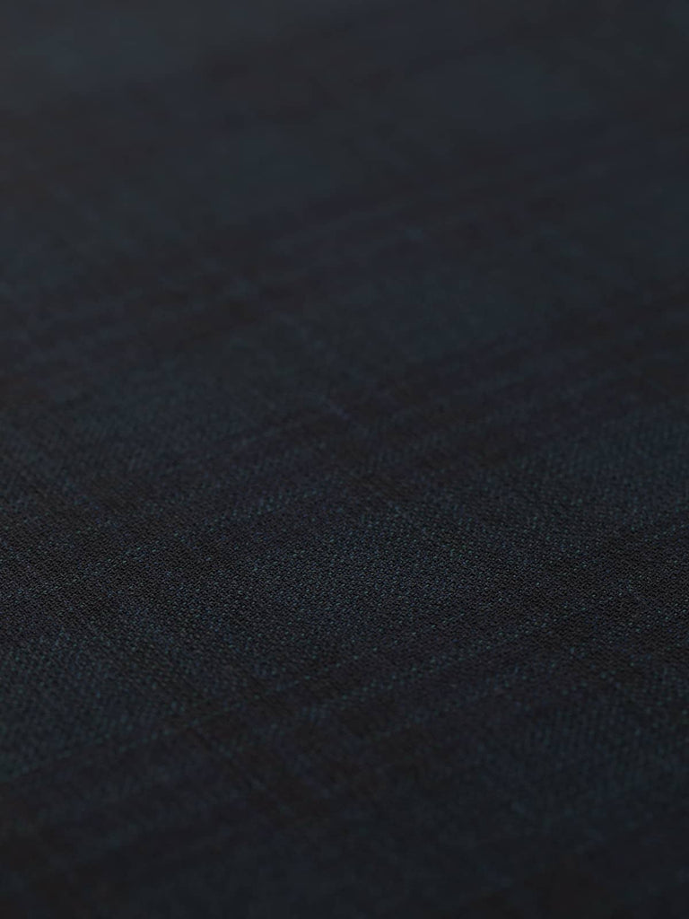 Close-up of Lazio District Check fabric, highlighting its refined check pattern and lightly textured weave. This lightweight, breathable suiting is perfect for creating elegant, smart attire.