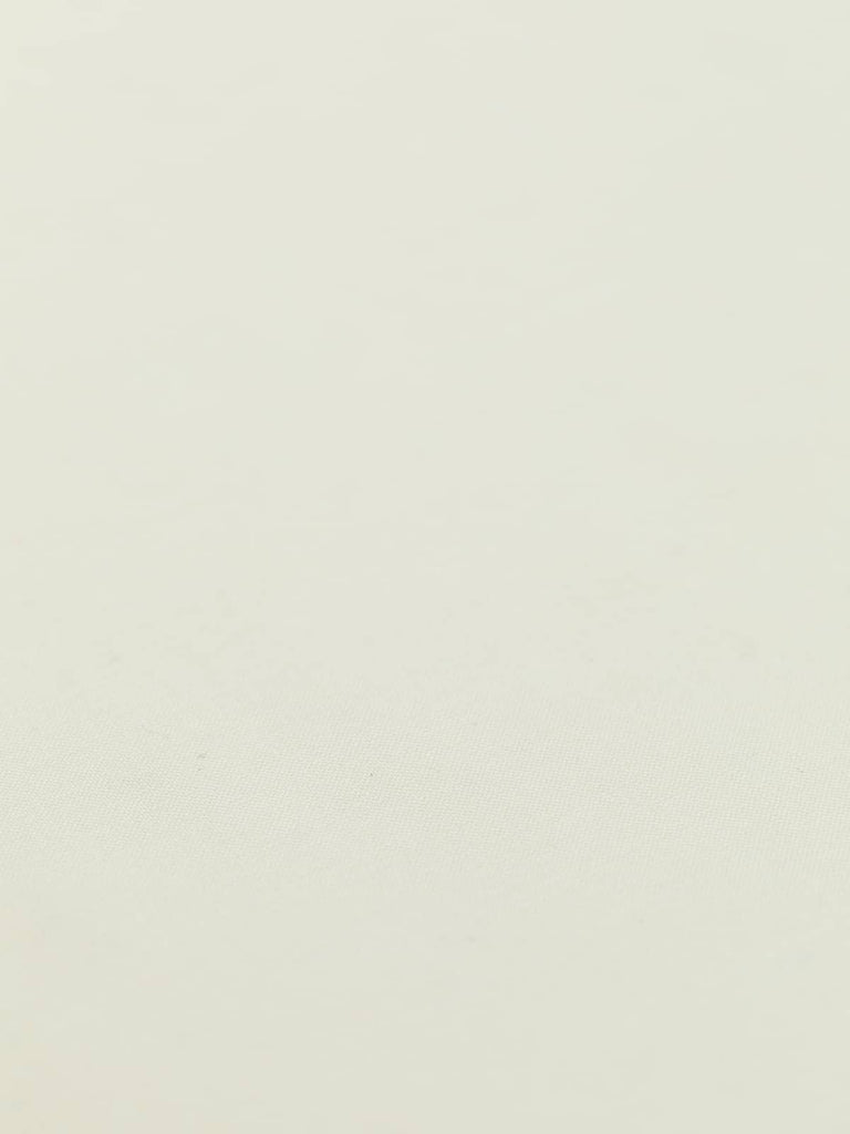 Flat angled view of Classic Ecru wool-blend worsted fabric, highlighting its pale cream-white tone, golden selvedge, and crisp yet elegant drape