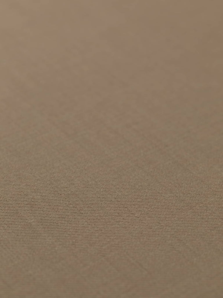 Flat angled view of Toasted Caramel wool twill fabric, showing refined finish, autumnal hue, and subtle lustrous sheen