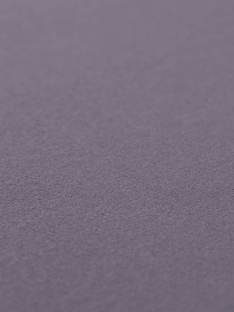 Angled photo of purple viscose jersey