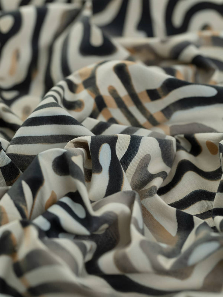 Zebra animal print on cotton fabric for shirts and dresses