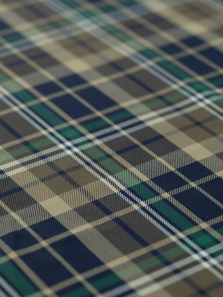 This versatile City Watch Plaid cotton gaberdine twill fabric offers a stylish plaid pattern with a fine twill weave and a subtly lustrous sheen. Perfect for autumn and winter wardrobes, it combines strength and drape, making it suitable for blazers, trench coats, denim jackets, and various accessories.