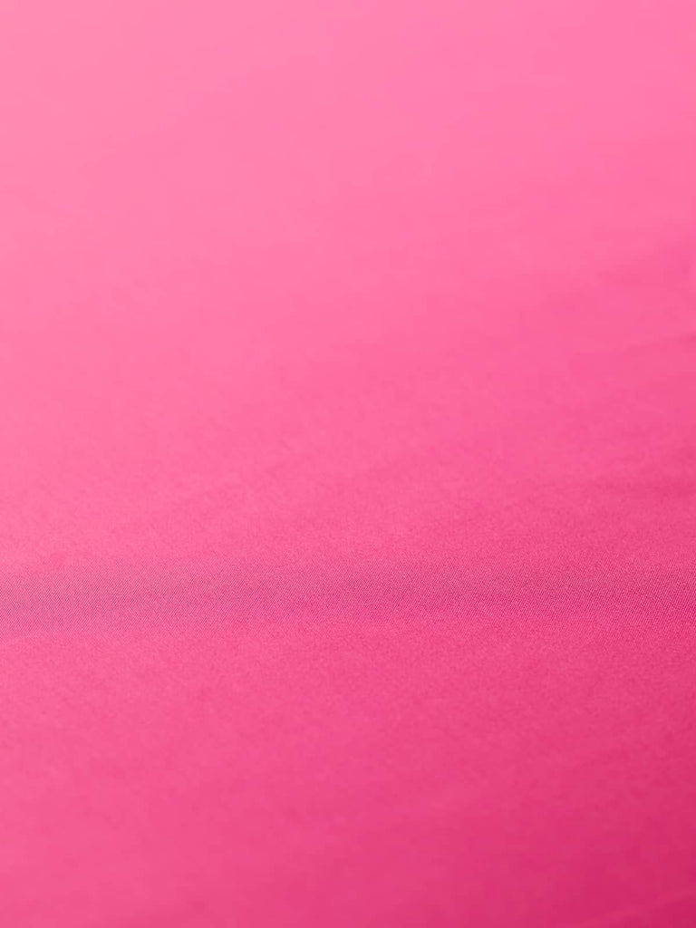 Luxurious satin fabric in a vibrant blue-toned pink shade, 140cm wide, silky smooth with a lustrous sheen, ideal for creating stylish linings in jackets, skirts, and dresses