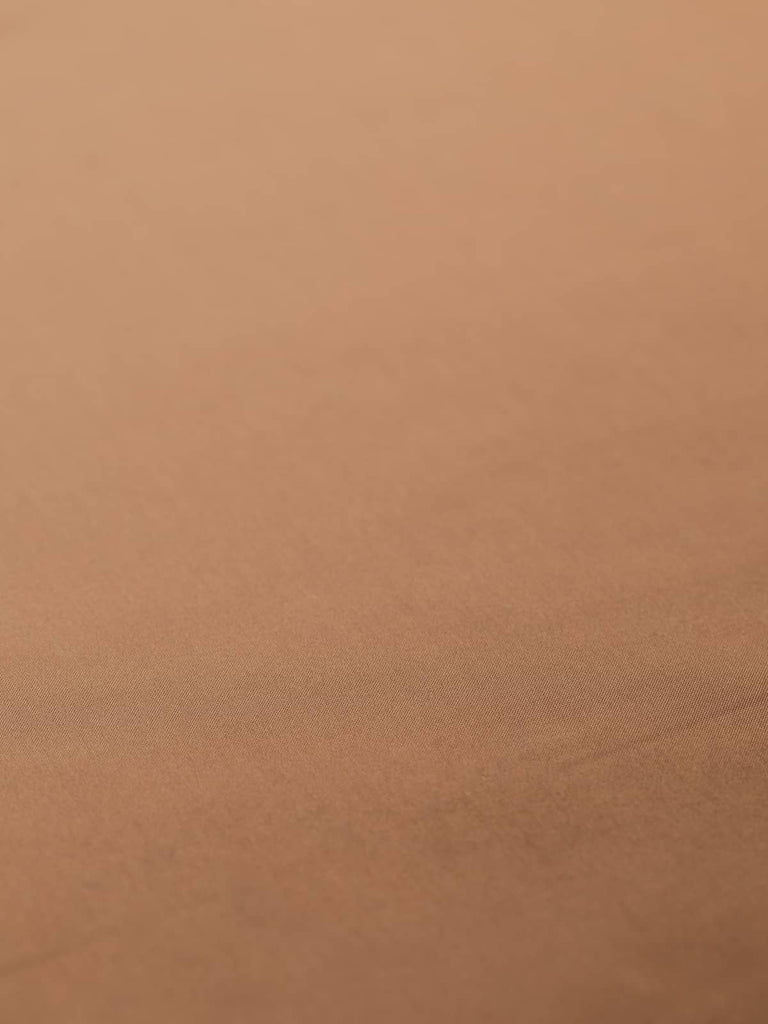Elegant chestnut brown lining fabric with a rich, burnished hue and subtle rust undertones, 144cm wide. Crafted from viscose and acetate in a fine satin weave, this light but durable fabric provides a silky, lustrous finish and a cool, drapey feel, ideal for classic tailoring and luxurious linings in coats, waistcoats, and fashion accessories.