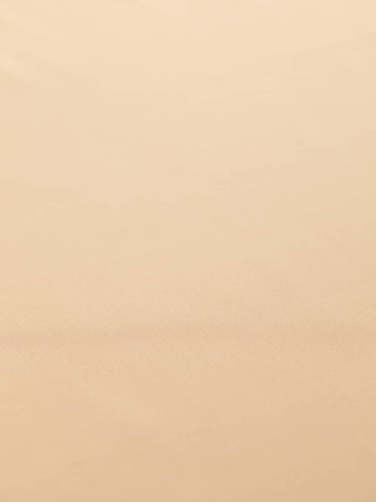 Soft warm beige lining fabric in a champagne hue, 140cm wide, featuring a pearl-like sheen and a superfine flat weave. Crafted from 100% acetate, this lightweight fabric provides a smooth, lustrous texture with a cool, drapey quality, perfect for lining coats, skirts, and stylish corporate wear.
