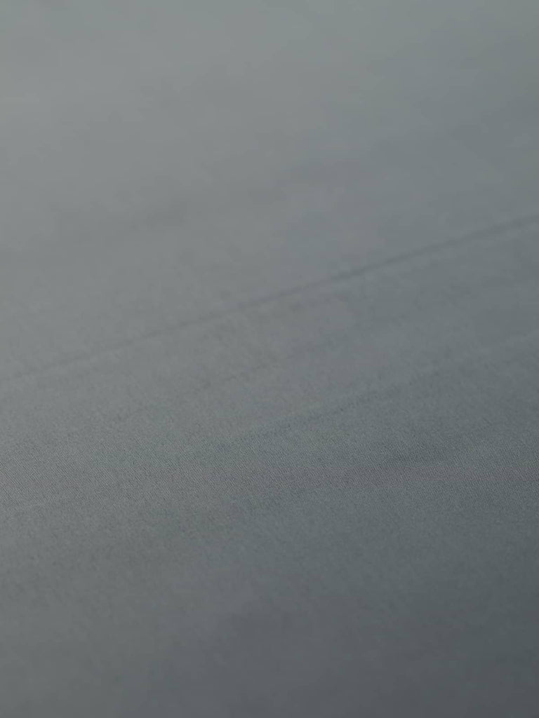 Soft, silky acetate satin fabric in deep grey for lining jackets and skirts.