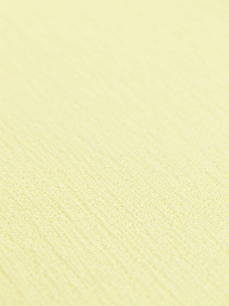 Yellow polyester fabric perfect for gathered and ruched makes, to create soft feminine styles