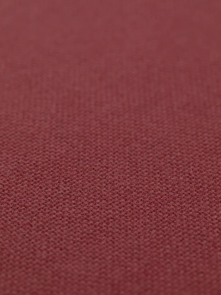 A flat angled view of Dusk Rose hopsack fabric, emphasizing its subtle, warm pink-brown shade. The fabric’s solid colour and heavy drape quality make it versatile for creative interior applications, perfect for adding a touch of luxury and warmth to any space.