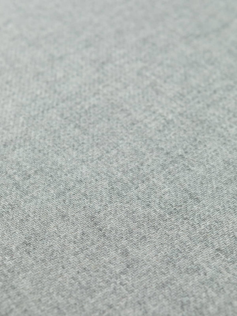 Overhead flat view of Fossil Sand Double-Faced Cashmere, 152cm wide, displaying the soft twill weave and subtle dual tones of grey and beige.