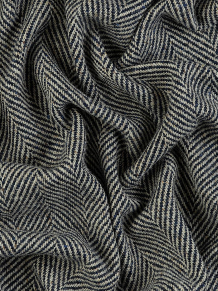 Twist of Nautical Navy Jumbo Herringbone showing soft brushed texture and thick lambswool yarns in navy, white, and flecked tones for cosy winter warmth.