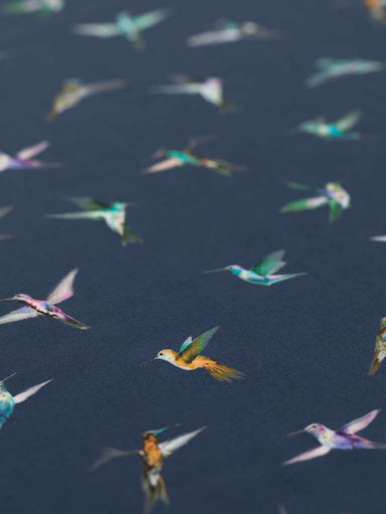 Hummingbirds printed onto viscose lawn fabric for garment sewing