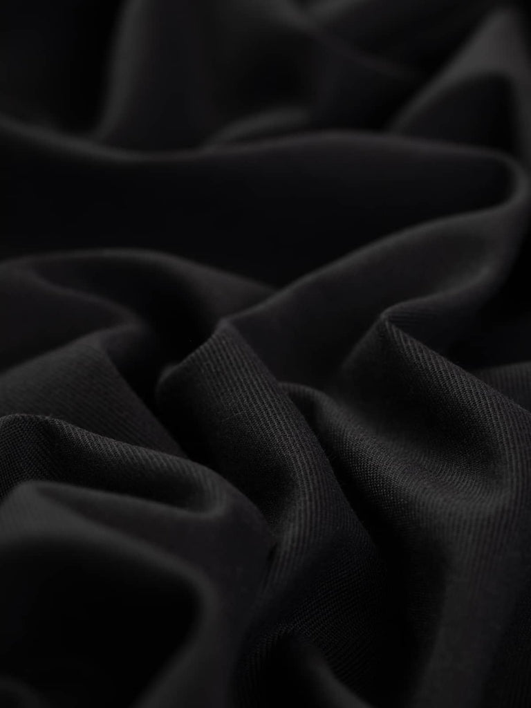 Buy Uniform Wool Twill Black fabric for home sewing 