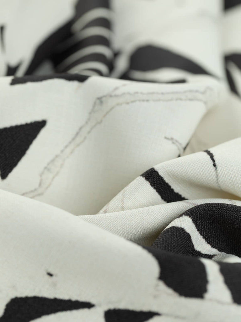 Cream Palm leaves on black background viscose fabric linen look 
