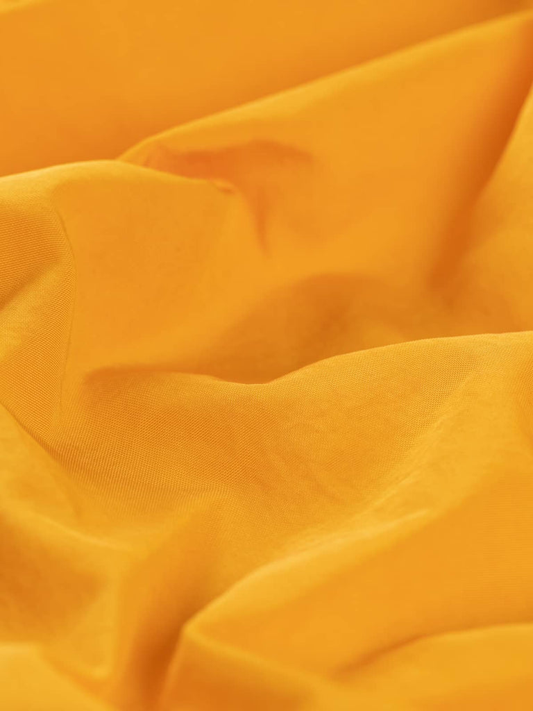 Buy yellow plain showerproof dressmaking nylon