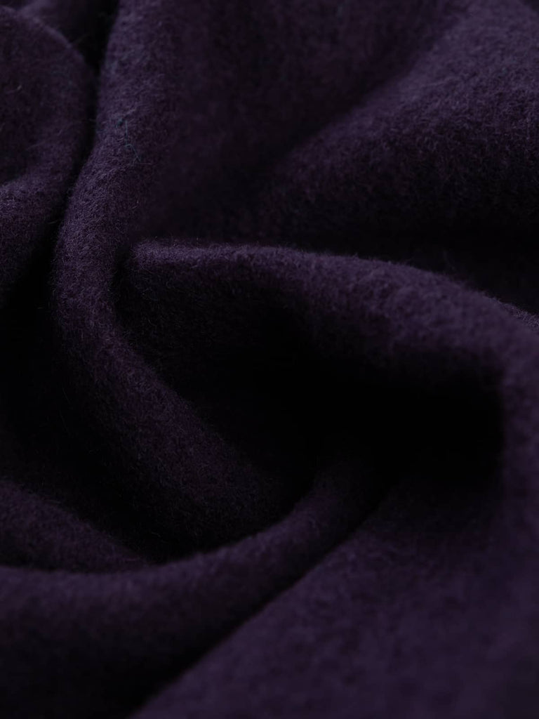 Twist of Amethyst 100% Boiled Wool Knit, 410gsm, showing soft felted texture and rich gemstone purple hue with subtle boucle detailing and a naturally structured drape.