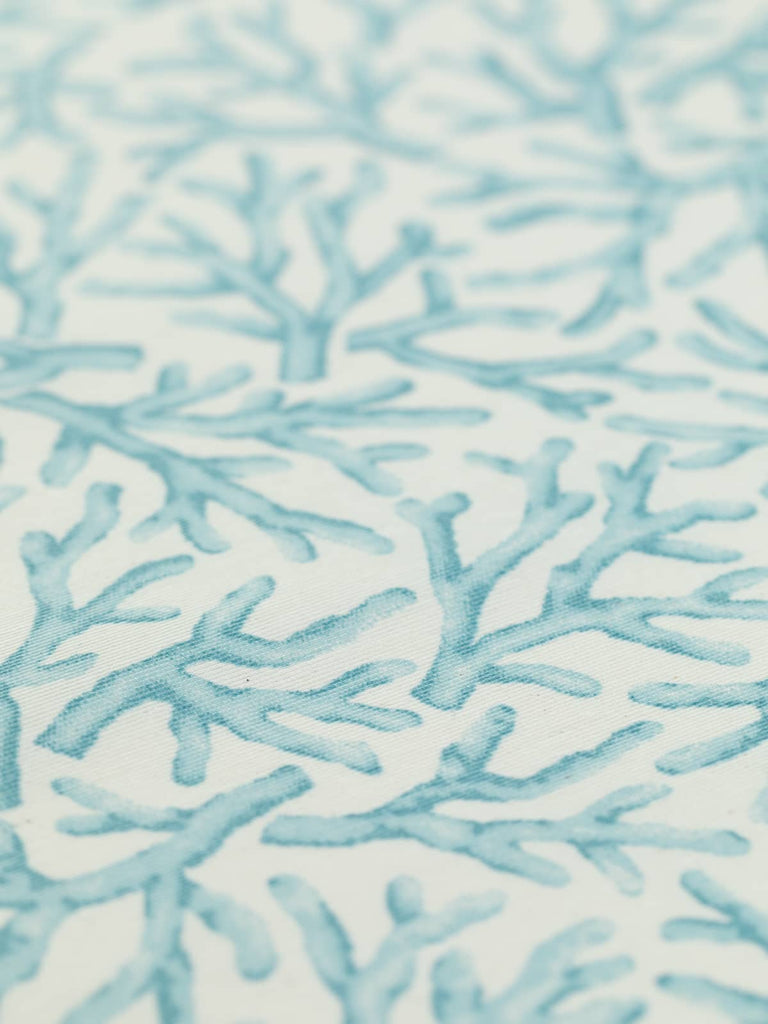 With a calming watercolor coral print, Aqua Coral Reef fabric is perfect for creating outdoor table covers, garden cushions, and practical items like tote bags. Its waterproof properties and easy-clean surface make it versatile and stylish.