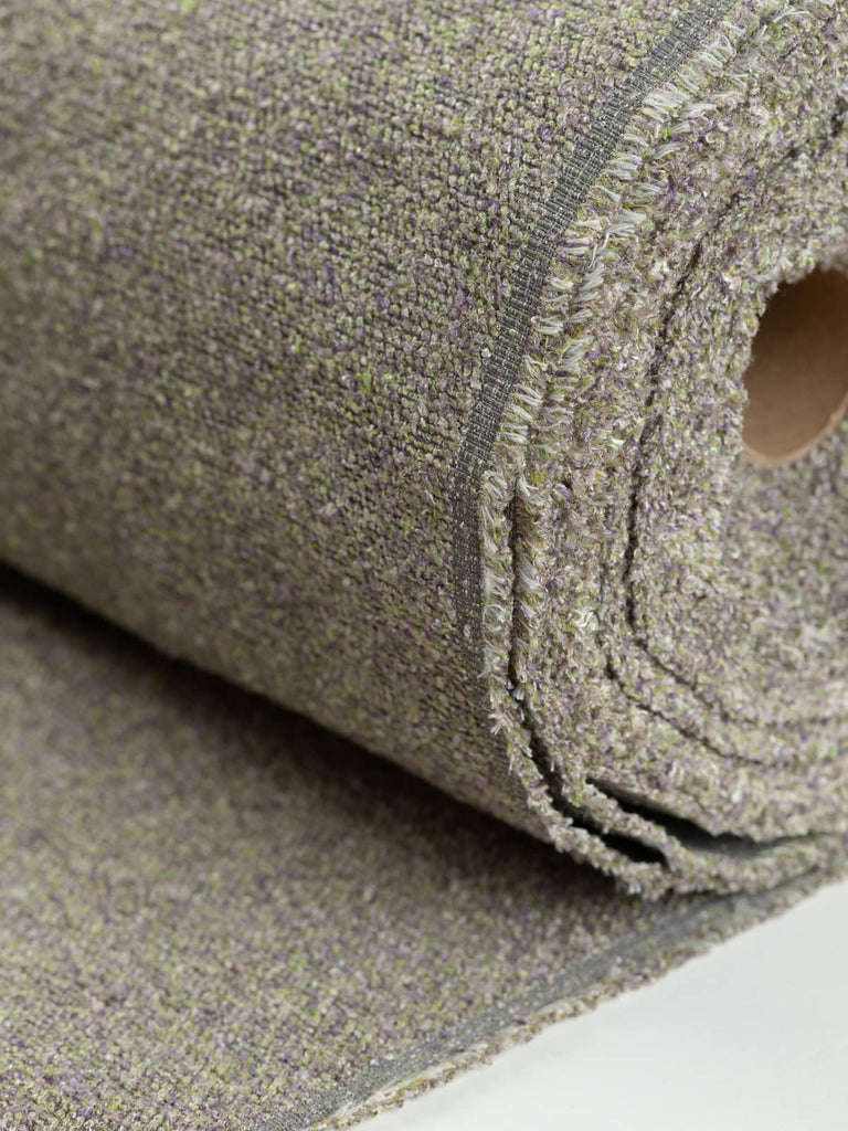 Heavyweight boucle fabric for furnishing & upholstery. Marled multi grey purple green tones lilac colourway. Available to buy for home furnishing projects.