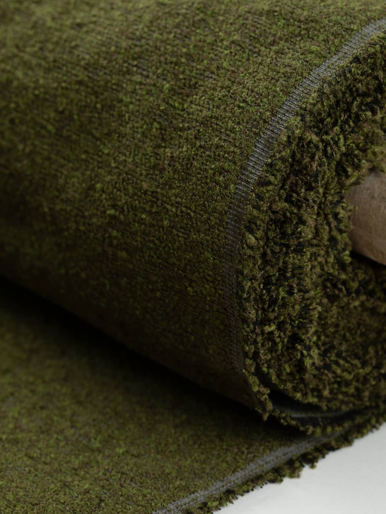 Heavyweight boucle fabric for furnishing & upholstery. Marled green earthy moss pine greencolourway. Available to buy for home furnishing projects.